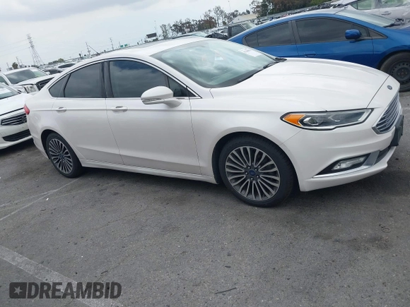 2017 Ford Fusion SE with VIN 3FA6P0HD0HR180188, listed as a IAAI auction lot 42146020 with 100,901 mi miles and . Bid and sale history available at DreamBid. Image 13.