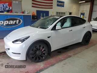 2022 Tesla Model Y Performance with VIN 7SAYGDEF9NF405370, listed as a Copart auction lot 43621095 with 52,292 mi miles and Salvage Title. Bid and sale history available at DreamBid. Image 1.