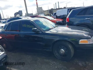 2009 Ford Police Interceptor with VIN 2FAHP71V59X110550, listed as a IAAI auction lot 41640643 with 184,461 mi miles and . Bid and sale history available at DreamBid. Image 13.