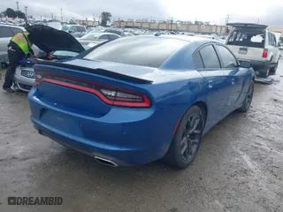 2021 Dodge Charger SXT with VIN 2C3CDXBG0MH605615, listed as a IAAI auction lot 41397218 with 80644 miles. Bid and sale history available at carsss.com. Image 4.