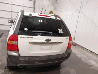 2007 Kia Sportage LX with VIN KNDJF724877399530, listed as a IAAI auction lot 41696698 with 124,967 mi miles. Bid and sale history available at carsss.com. Image 16.