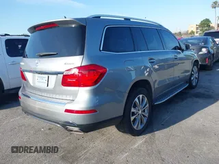 2014 Mercedes-Benz GL-Class GL 450 with VIN 4JGDF7CE3EA340899, listed as a IAAI auction lot 41849790 with 100,502 mi miles. Bid and sale history available at carsss.com. Image 4.
