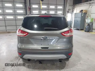 2014 Ford Escape SE with VIN 1FMCU9G99EUC45854, listed as a IAAI auction lot 41986959 with 124,591 mi miles. Bid and sale history available at carsss.com. Image 16.