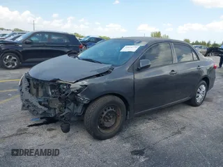 2013 Toyota Corolla L with VIN 5YFBU4EE3DP078437, listed as a IAAI auction lot 42024770 with 102,321 mi miles and . Bid and sale history available at DreamBid. Image 2.