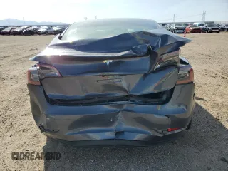 2023 Tesla Model 3 with VIN 5YJ3E1EA8PF648073, listed as a Copart auction lot 49284775 with 20,498 mi miles and Salvage Title. Bid and sale history available at DreamBid. Image 6.