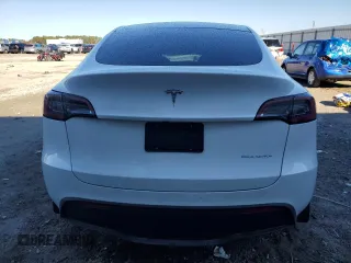 2023 Tesla Model Y Long Range z VIN 7SAYGAEE1PF810888, wystawiony jako Copart lot #88991735 z przebiegiem Nie podano mil oraz Nie do naprawy • Non repairable. Historia ofert i sprzedaży dostępna na DreamBid. Obrazek 6.