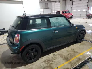 2008 MINI Hardtop with VIN WMWMF33558TT66729, listed as a Copart auction lot 51153645 with 127,357 mi miles and Salvage Title. Bid and sale history available at DreamBid. Image 3.