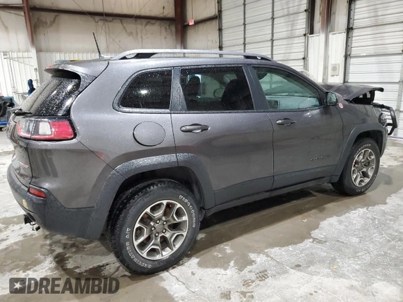 2020 Jeep Cherokee Trailhawk z VIN 1C4PJMBX5LD591873, wystawiony jako Copart lot #54308695 z przebiegiem 34 615 mil mil oraz Szkoda całkowita • Salvage title. Historia ofert i sprzedaży dostępna na DreamBid. Obrazek 3.