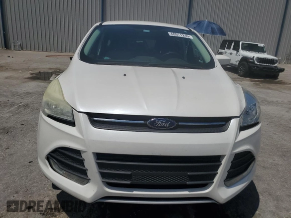 2013 Ford Escape SE z VIN 1FMCU0GX6DUD64499, wystawiony jako Copart lot #60971245 z przebiegiem 63 411 mil mil oraz Szkoda całkowita • Salvage title. Historia ofert i sprzedaży dostępna na DreamBid. Obrazek 5.