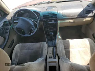 2002 Subaru Forester S with VIN JF1SF65522H736740, listed as a Copart auction lot 60640175 with 318,267 mi miles and Salvage title. Bid and sale history available at DreamBid. Image 8.