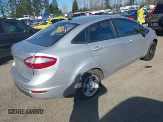 2017 Ford Fiesta SE z VIN 3FADP4BJXHM143658, wystawiony jako IAAI lot #41693045 z przebiegiem 142 361 mil mil oraz . Historia ofert i sprzedaży dostępna na DreamBid. Obrazek 4.