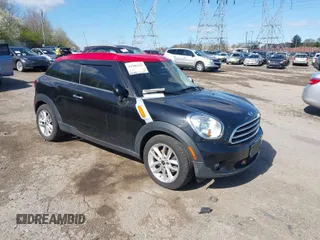 2014 MINI Paceman z VIN WMWSS1C51EWN94518, wystawiony jako IAAI lot #41986247 z przebiegiem 175 940 mil mil oraz . Historia ofert i sprzedaży dostępna na DreamBid. Obrazek 1.