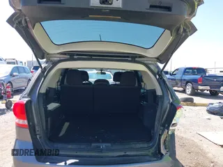 2013 Dodge Journey SXT with VIN 3C4PDDBGXDT650886, listed as a IAAI auction lot 41864331 with 224,579 mi miles and . Bid and sale history available at DreamBid. Image 17.