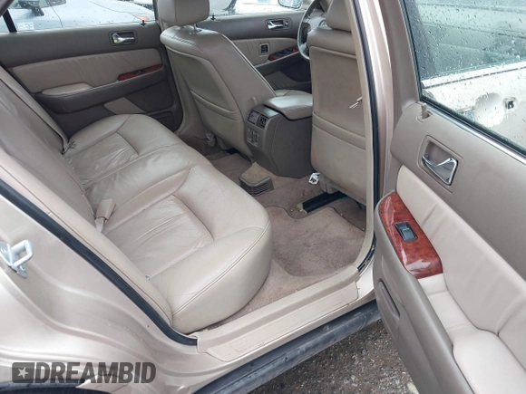 2000 Acura RL w/Navigation System with VIN JH4KA9662YC001438, listed as a IAAI auction lot 41522017 with 169,129 mi miles. Bid and sale history available at carsss.com. Image 8.