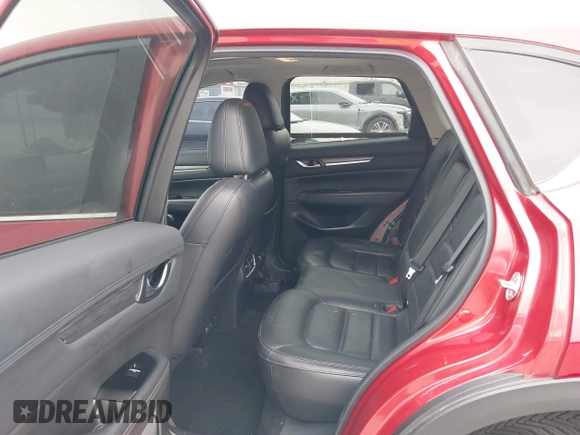2020 Mazda CX-5 Grand Touring with VIN JM3KFADM7L0729537, listed as a IAAI auction lot 41864569 with 82,998 mi miles. Bid and sale history available at carsss.com. Image 8.
