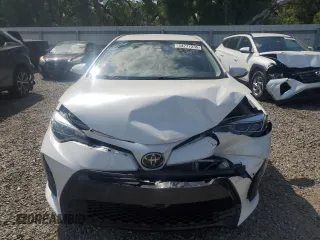 2019 Toyota Corolla L with VIN 5YFBURHE5KP921284, listed as a Copart auction lot 54277235 with 100,935 mi miles and Salvage Title. Bid and sale history available at DreamBid. Image 5.