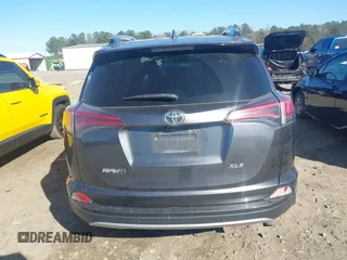 2018 Toyota RAV4 XLE with VIN JTMWFREV9JJ200629, listed as a IAAI auction lot 41821491 with 184,706 mi miles. Bid and sale history available at carsss.com. Image 16.