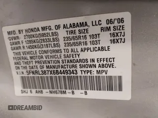 2006 Honda Odyssey EX-L with VIN 5FNRL387X6B449343, listed as a IAAI auction lot 42162759 with 242,590 mi miles. Bid and sale history available at carsss.com. Image 9.