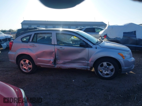 2009 Dodge Caliber SXT z VIN 1B3HB48A79D103215, wystawiony jako IAAI lot #41973831 z przebiegiem 134 797 mil mil oraz . Historia ofert i sprzedaży dostępna na DreamBid. Obrazek 13.