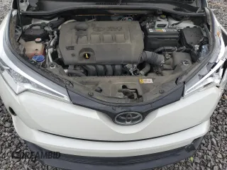 2018 Toyota C-HR XLE z VIN JTNKHMBXXJ1003871, wystawiony jako Copart lot #49984355 z przebiegiem 101 395 mil mil oraz Szkoda całkowita • Salvage title. Historia ofert i sprzedaży dostępna na DreamBid. Obrazek 11.