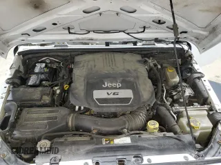 2015 Jeep Wrangler Unlimited Sport with VIN 1C4BJWDG0FL737965, listed as a Copart auction lot 56711765 with 149,528 mi miles and Salvage title. Bid and sale history available at DreamBid. Image 12.