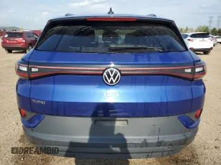 2021 Volkswagen ID.4 Pro S z VIN WVGTMPE25MP028583, wystawiony jako Copart lot #54329775 z przebiegiem Nie podano mil oraz Szkoda całkowita • Salvage title. Historia ofert i sprzedaży dostępna na DreamBid. Obrazek 6.