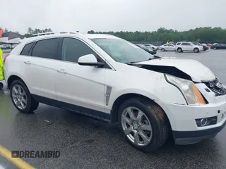 2012 Cadillac SRX Performance Collection with VIN 3GYFNBE38CS547423, listed as a IAAI auction lot 42276365 with 157,786 mi miles and . Bid and sale history available at DreamBid. Image 1.