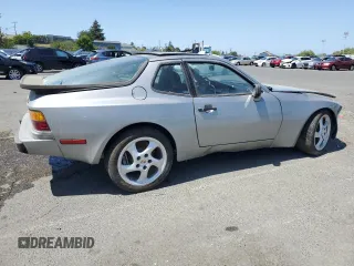 1986 Porsche 944 z VIN WP0AA0946GN459926, wystawiony jako Copart lot #52357845 z przebiegiem 89 937 mil mil oraz Szkoda całkowita • Salvage title. Historia ofert i sprzedaży dostępna na DreamBid. Obrazek 3.