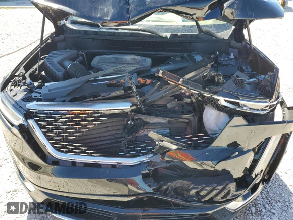 2024 Cadillac XT6 Premium Luxury z VIN 1GYKPERS1RZ755490, wystawiony jako Copart lot #49706575 z przebiegiem 4 239 mil mil oraz Szkoda całkowita • Salvage title. Historia ofert i sprzedaży dostępna na DreamBid. Obrazek 12.