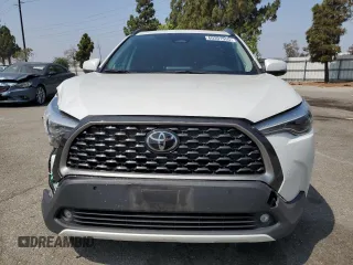 2023 Toyota Corolla Cross XLE with VIN 7MUDAAAG2PV042957, listed as a Copart auction lot 60301555 with 39,211 mi miles and Salvage title. Bid and sale history available at DreamBid. Image 5.