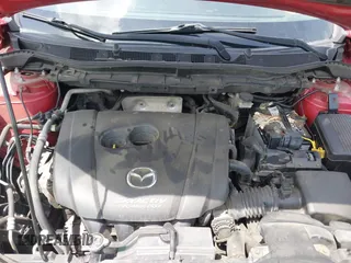 2014 Mazda CX-5 Grand Touring with VIN JM3KE2DY3E0382920, listed as a IAAI auction lot 42102876 with 324,608 mi miles. Bid and sale history available at carsss.com. Image 10.