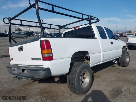 2002 GMC Sierra 1500 SLE with VIN 2GTEC19V221181711, listed as a IAAI auction lot 41571536 with 162,296 mi miles. Bid and sale history available at carsss.com. Image 4.