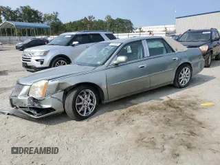 2007 Cadillac DTS Performance with VIN 1G6KD57967U131549, listed as a Copart auction lot 70918804 with 73,618 mi miles and Salvage Title. Bid and sale history available at carsss.com. Image 1.