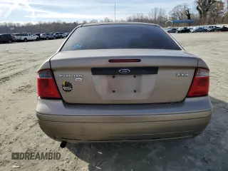 2005 Ford Focus S with VIN 1FAFP34N35W141023, listed as a Copart auction lot 84230574 with 244,545 mi miles and Salvage Title. Bid and sale history available at carsss.com. Image 6.