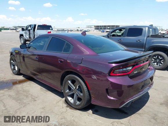 2021 Dodge Charger R/T with VIN 2C3CDXCT2MH574377, listed as a IAAI auction lot 42760667 with 49,295 mi miles and . Bid and sale history available at DreamBid. Image 3.