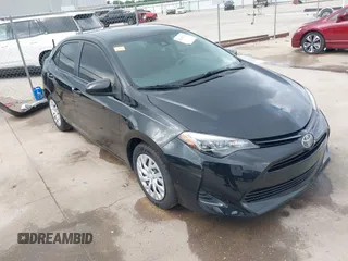 2019 Toyota Corolla L z VIN 5YFBURHE9KP901622, wystawiony jako IAAI lot #42162711 z przebiegiem 92 587 mil mil oraz . Historia ofert i sprzedaży dostępna na DreamBid. Obrazek 1.