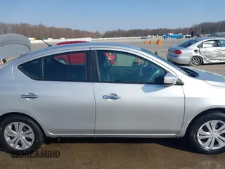 2017 Nissan Versa SV z VIN 3N1CN7AP3HK427702, wystawiony jako IAAI lot #41741711 z przebiegiem 146 889 mil mil oraz . Historia ofert i sprzedaży dostępna na DreamBid. Obrazek 13.