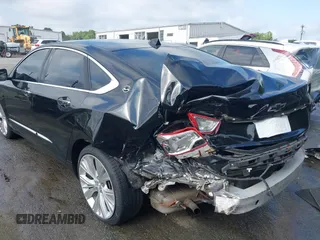 2014 Chevrolet Impala LTZ with VIN 2G1155S39E9102462, listed as a IAAI auction lot 42618513 with 121,943 mi miles and . Bid and sale history available at DreamBid. Image 3.