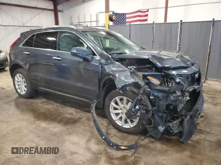 2021 Cadillac XT4 AWD Luxury with VIN 1GYFZBR49MF074936, listed as a Copart auction lot 66884034 with 38,695 mi miles and Salvage Title. Bid and sale history available at carsss.com. Image 4.