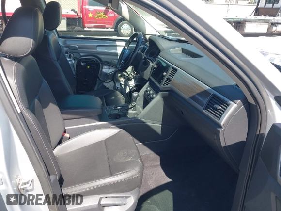 2018 Volkswagen Atlas SE с VIN 1V2DR2CA9JC502205, выставлен на аукционе IAAI как лот 41983821 с пробегом 99 618 миль миль и . История ставок и продаж доступна на DreamBid. Изображение 5.