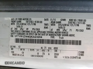 2016 Ford Transit Cargo z VIN 1FTYR1ZM4GKA23204, wystawiony jako Copart lot #55861645 z przebiegiem 222 430 mil mil oraz Szkoda całkowita • Salvage title. Historia ofert i sprzedaży dostępna na DreamBid. Obrazek 13.