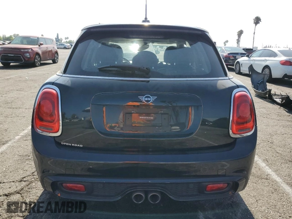 2021 MINI Hardtop 4 Door Cooper S с VIN WMWXU9C06M2N01629, выставлен на аукционе Copart как лот 65398605 с пробегом 74 356 миль миль и Списание • Salvage title. История ставок и продаж доступна на DreamBid. Изображение 6.