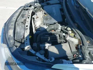 2018 Chevrolet Cruze LT z VIN 1G1BH5SEXJ7100003, wystawiony jako IAAI lot #41677824 z przebiegiem 100 935 mil mil oraz . Historia ofert i sprzedaży dostępna na DreamBid. Obrazek 19.