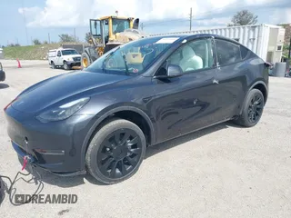 2024 Tesla Model Y Long Range z VIN 7SAYGAEE5RF074699, wystawiony jako IAAI lot #40537868 z przebiegiem Nie podano mil oraz . Historia ofert i sprzedaży dostępna na DreamBid. Obrazek 2.