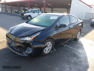 2019 Toyota Prius L Eco with VIN JTDKARFU9K3090948, listed as a IAAI auction lot 41400008 with 113,323 mi miles. Bid and sale history available at carsss.com. Image 2.