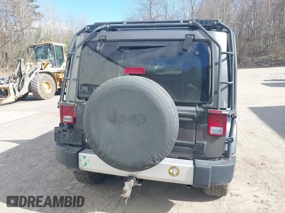 2014 Jeep Wrangler Unlimited Sahara с VIN 1C4BJWEG3EL267279, выставлен на аукционе IAAI как лот 42083836 с пробегом 81 796 миль миль и . История ставок и продаж доступна на DreamBid. Изображение 16.