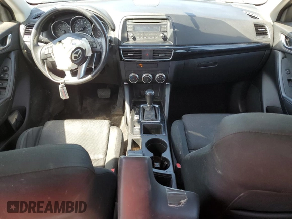 2016 Mazda CX-5 Sport с VIN JM3KE4BY1G0611368, выставлен на аукционе Copart как лот 56979385 с пробегом 106 397 миль миль и Списание • Salvage title. История ставок и продаж доступна на DreamBid. Изображение 8.