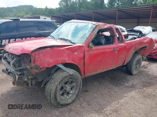 2001 Nissan Frontier SE Desert Runner z VIN 1N6ED26T31C354339, wystawiony jako IAAI lot #42279697 z przebiegiem Nie podano mil oraz . Historia ofert i sprzedaży dostępna na DreamBid. Obrazek 2.