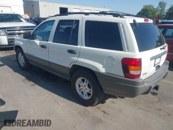 2002 Jeep Grand Cherokee Laredo with VIN 1J4GW48S22C131470, listed as a IAAI auction lot 42599375 with 200,815 mi miles and . Bid and sale history available at DreamBid. Image 3.
