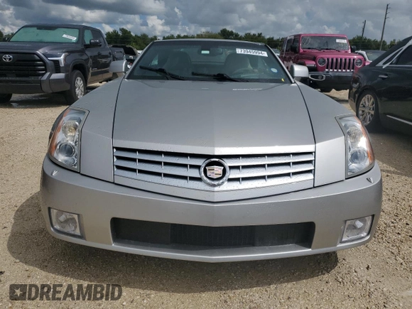 2006 Cadillac XLR z VIN 1G6YV36A365601441, wystawiony jako Copart lot #73945994 z przebiegiem Nie podano mil oraz Szkody całkowita. Historia ofert i sprzedaży dostępna na DreamBid. Obrazek 5.